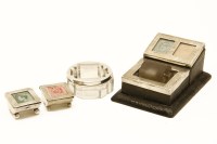 Lot 115 - A hallmarked silver stamp box and roller