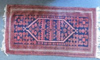 Lot 480 - A hand kitted Persian Bokhara rug
