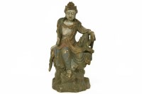 Lot 414 - A Chinese carving of a seated female