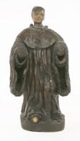 Lot 410 - A carved figure of a saint