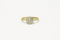 Lot 63 - An Art Deco gold diamond set daisy cluster ring
2.28g