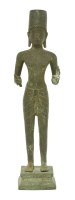 Lot 320 - An Eastern bronze standing figure