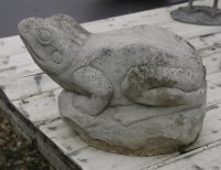 Lot 1001 - A garden sculpture of a frog in cast stone