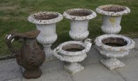 Lot 1022 - Three cast iron urns