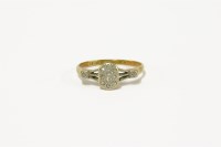 Lot 57 - A gold late Edwardian pavé set diamond plaque ring