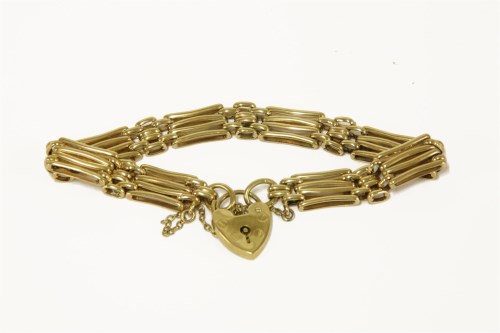 Lot 44 - A 9ct gold four bar gate link bracelet with padlock
17.51g