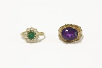 Lot 65 - A 9ct gold single stone amethyst ring with textured shoulders
