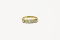 Lot 70 - A gold five stone graduating diamond ring