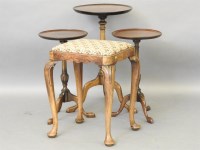 Lot 543 - A pair of mahogany wine tables and tripod supports