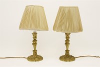 Lot 401 - A pair of ormolu candlesticks converted into table lamps