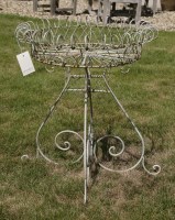 Lot 1027 - A Regency style and white painted wirework plant stand