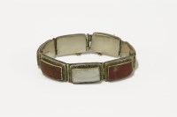 Lot 11 - A silver Scottish hardstone panel bracelet