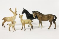 Lot 243 - A family of Beswick deer