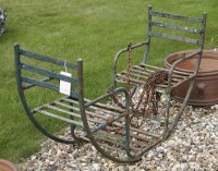 Lot 1043 - A possibly French iron hanging double swing seat