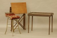 Lot 634 - A brass music stool