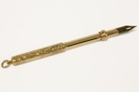 Lot 122 - A gold self propelling telescopic fountain pen