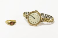 Lot 10 - An early 19th century gold three stone garnet ring (two stones deficient and later shank)
