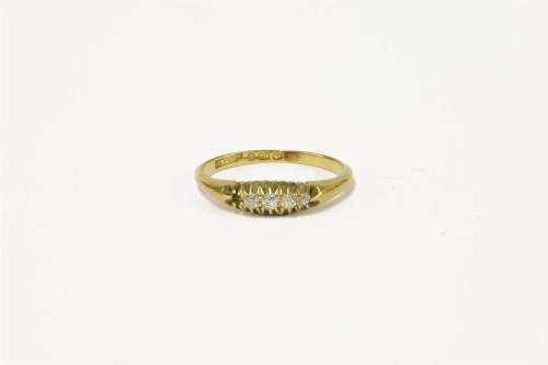 Lot 95 - An 18ct gold five stone diamond boat shaped ring (one stone deficient)