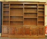 Lot 530 - A Victorian design walnut breakfront bookcase