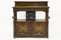 Lot 639 - A honey oak buffet