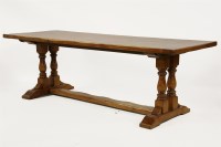 Lot 620 - A large cherry wood farmhouse table
