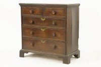 Lot 630 - George III five drawer oak chest of two shelves above three long drawers