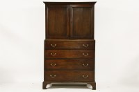 Lot 638 - A George III oak linen press