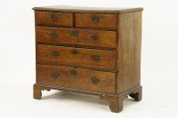 Lot 518 - A George III oak chest