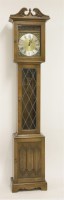 Lot 388 - A modern 'Old Charm' oak long case clock