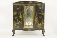 Lot 544 - A lacquered Chinoiserie display cabinet