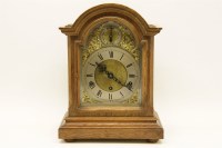 Lot 298 - An oak Westminster chiming mantel clock
