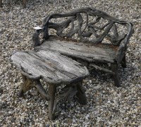 Lot 1105 - A children's rustic 'root' bench