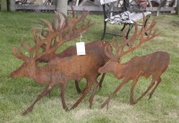 Lot 1101 - A small herd of rusty reindeer silhouette lawn ornaments