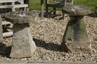 Lot 1096 - A pair of 18th century carved quartzite saddlestones