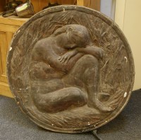 Lot 1095 - A large cast plaster medallion of a seated figure