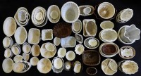 Lot 354 - A large quantity of pottery unnamed jelly moulds