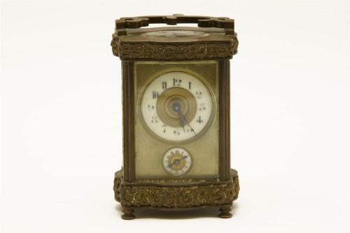 Lot 213 - A French brass carriage clock