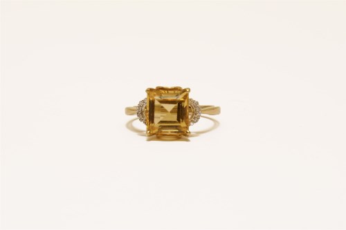 Lot 32 - A 9ct gold single stone emerald cut citrine ring