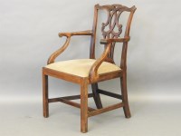 Lot 558 - A 19th century mahogany open armchair with pierced splat back