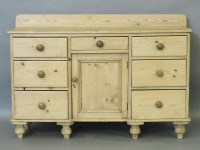 Lot 512 - A late Victorian early 20th century pine sideboard
