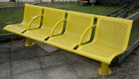 Lot 1077 - A British Rail four seat yellow bench