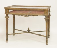 Lot 511 - A carved and painted table vitrine