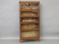 Lot 540 - A pair of Globe Wernicke five-tier glazed bookcases
