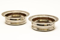 Lot 174 - A pair of silver plated wine coasters