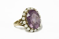 Lot 8 - A 9ct gold amethyst and cultured pearl cluster ring
