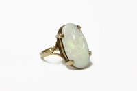 Lot 5 - A single stone oval cabochon opal ring