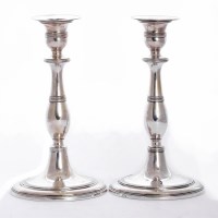 Lot 33 - A pair of Portuguese silver candlesticks