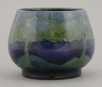 Lot 33 - A Moorcroft 'Moonlit Blue' squat vase
