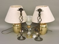 Lot 291 - A pair of wrought metal candlesticks