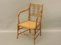 Lot 507 - A 19th century simulated bamboo elbow chair